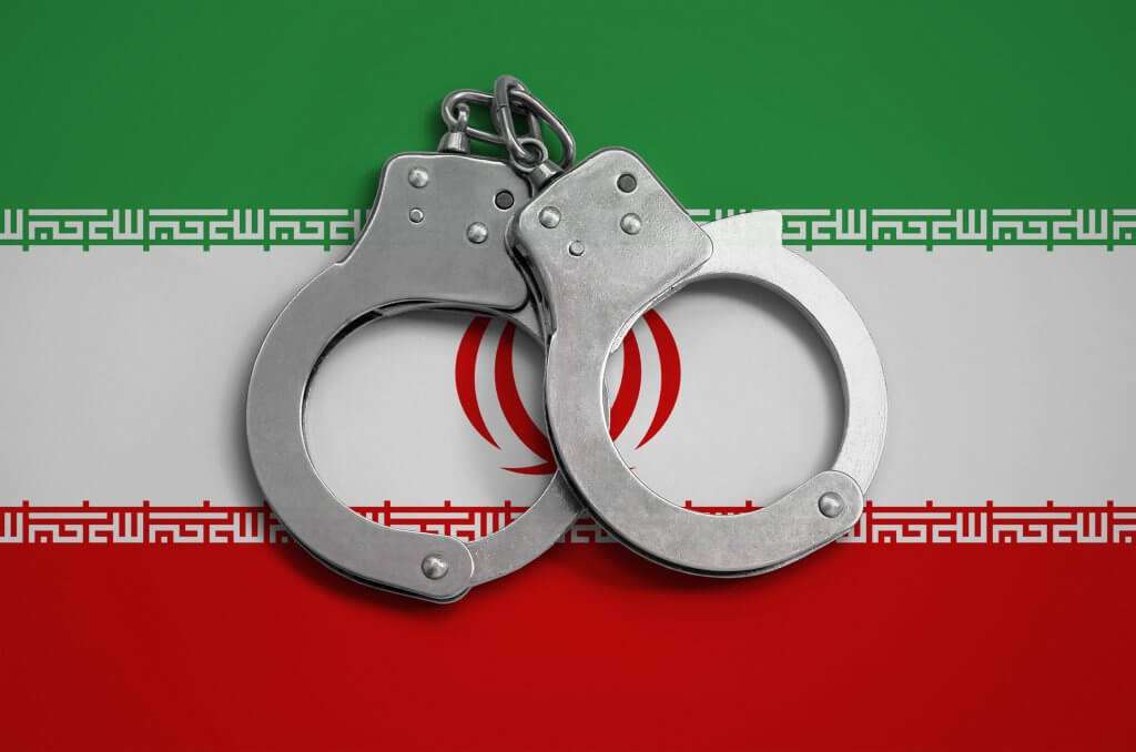iran flag and police handcuffs 2022 10 26 05 14 59 utc