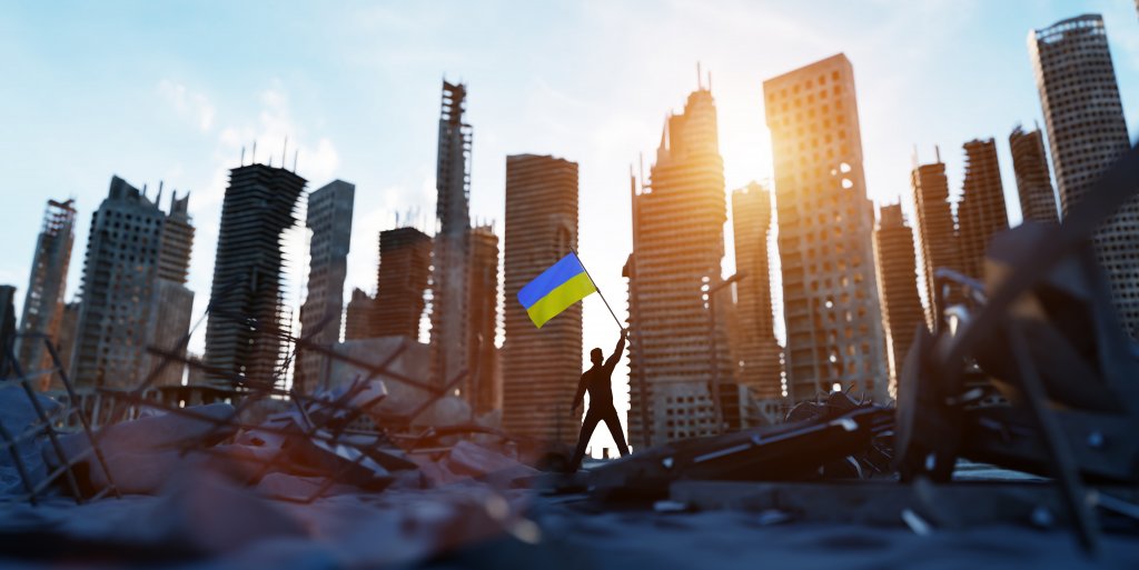 man with ukraine flag on city ruin ukrainian vict 2022 12 16 11 10 32 utc